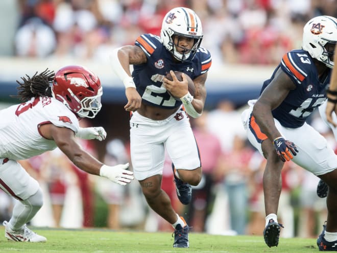 Auburn position grades versus Arkansas