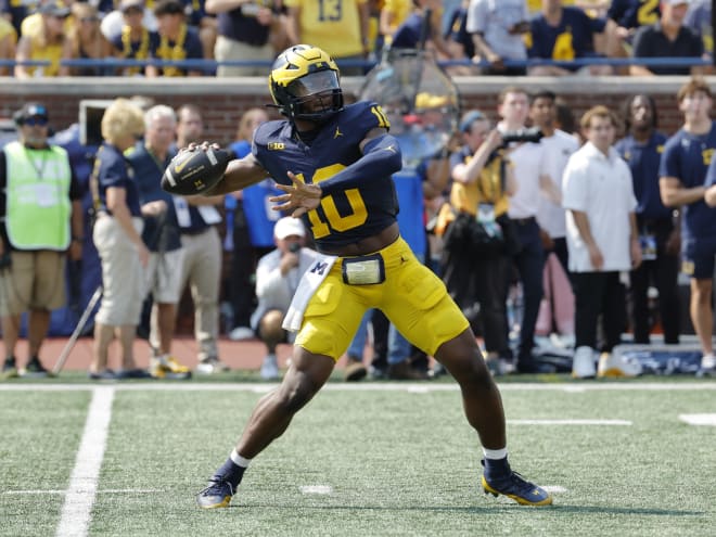 Sherrone Moore evaluates quarterback play of Davis Warren, Alex Orji