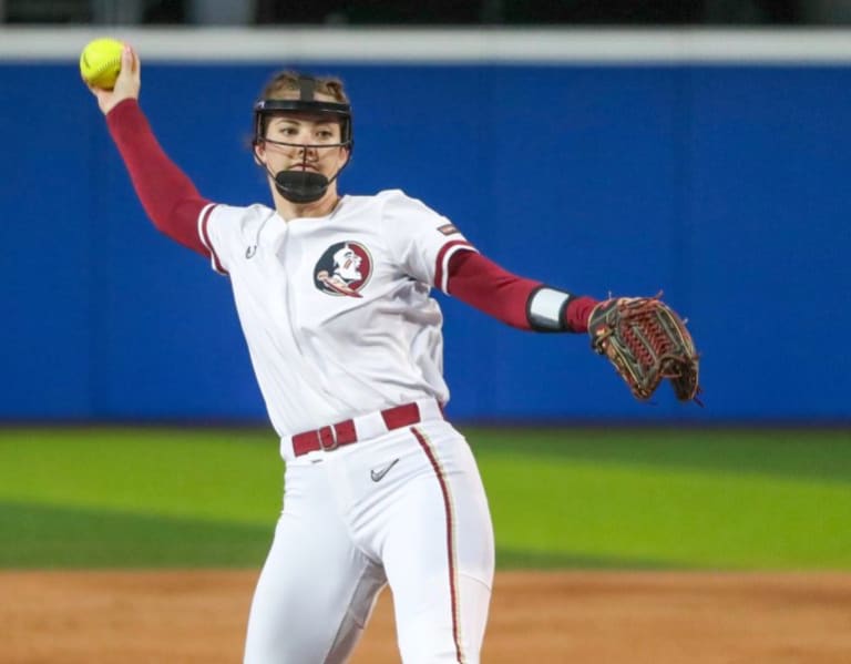 Florida State's Amaya Ross (12) runs to first base during an NCAA