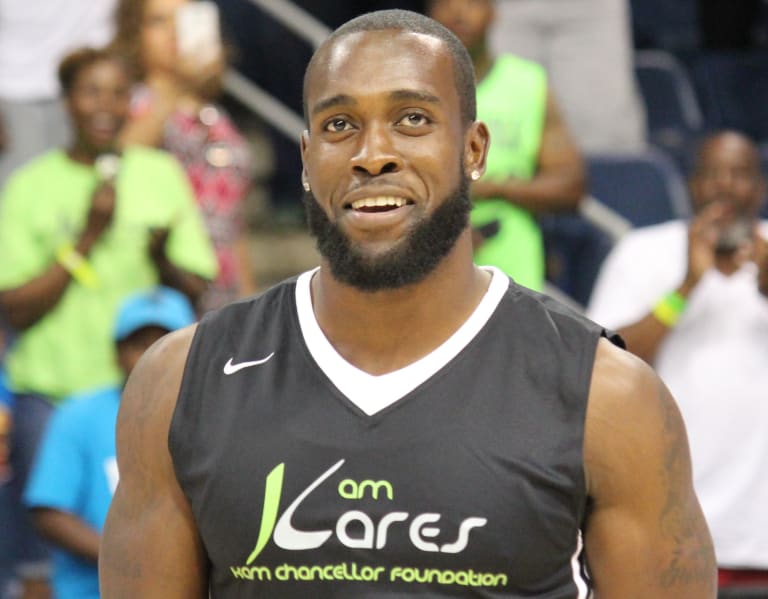 Kam Chancellor hosts basketball game 