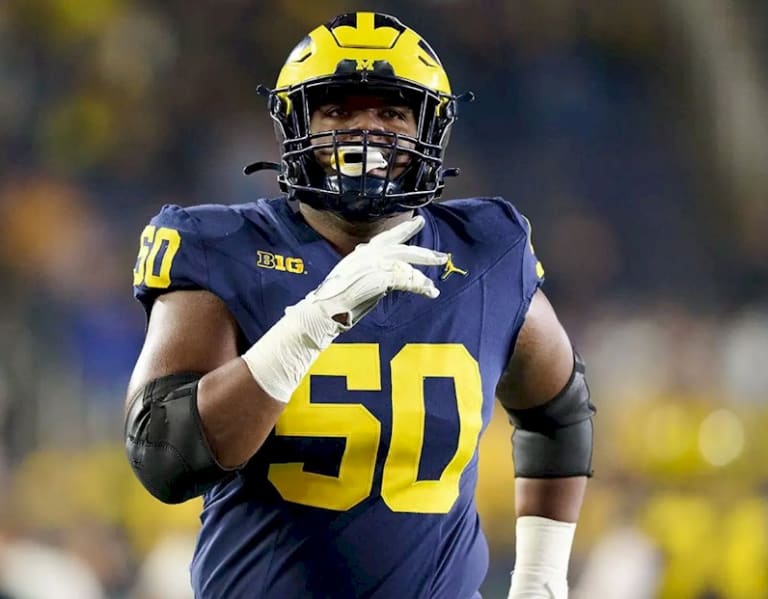 Former Michigan Lineman Amir Herring Commits to Kansas Jayhawks: Relationship with Coaches and Focus on Well-Being Impress