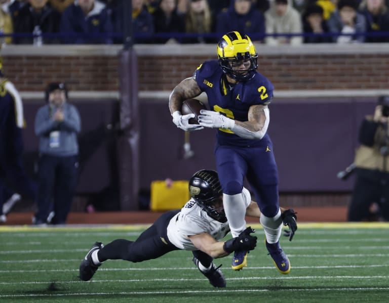 Michigan's Dominant Rushing Attack Leads to Victory with 5 Touchdowns