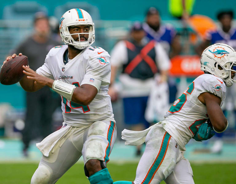 Miami Dolphins quarterback Jacoby Brissett (14) throws during NFL