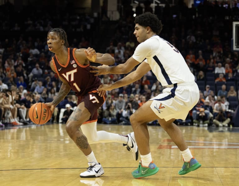 Schutt and Lawal help Hokies hold on, beat the Wahoos 75-74