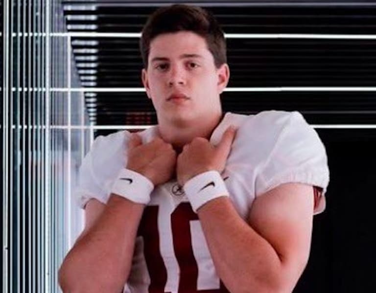 Eli Holstein takes in Alabama spring game.