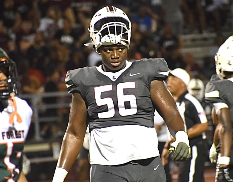 Michael Fasusi, a five-star offensive tackle, details his official visits and top contenders.