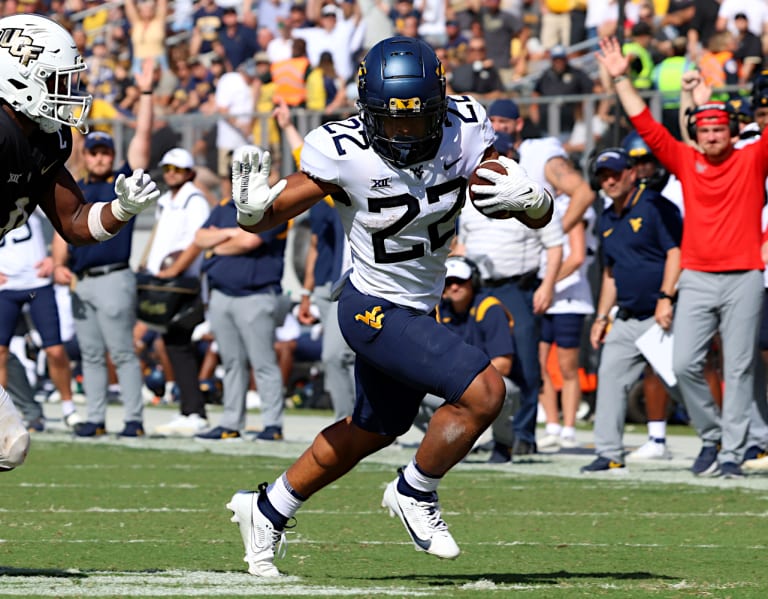 West Virginia's Dominant Rushing Attack Shines Against UCF Record