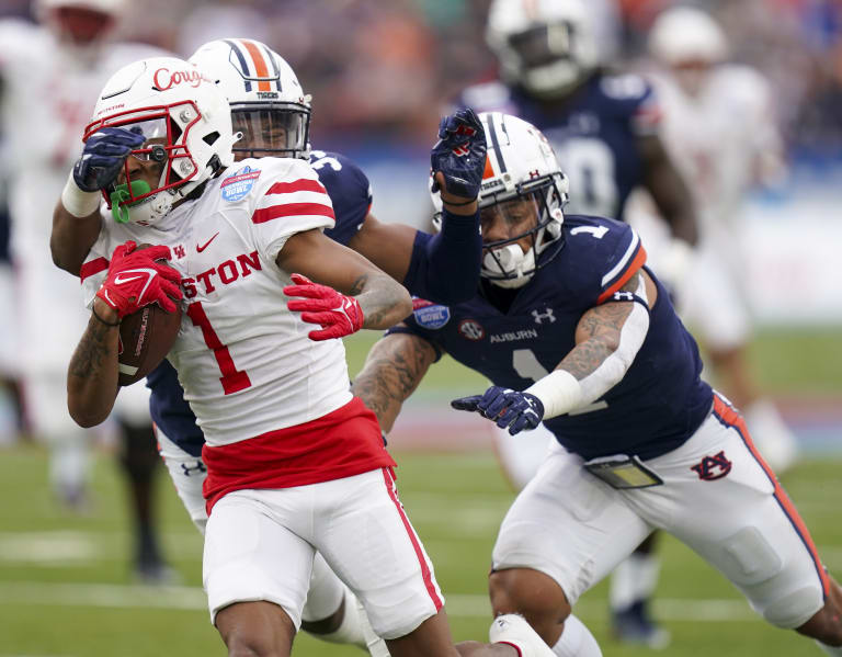 The Houston Cougars Defeat Auburn In The Ticket Smarter Birmingham Bowl ...