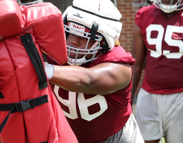 Why Alabama football players are wearing padded helmets in