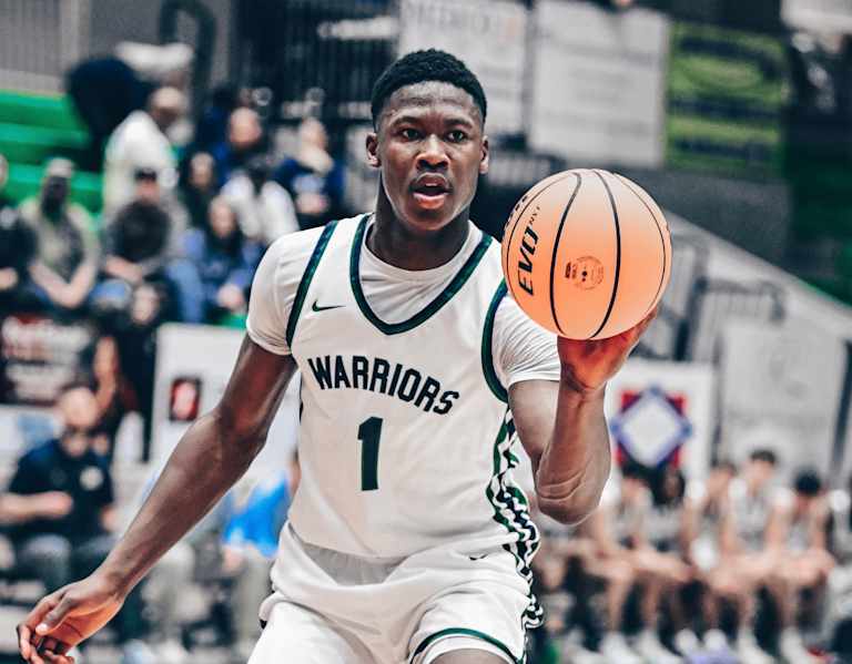 Four-star in-state guard commits to Arkansas