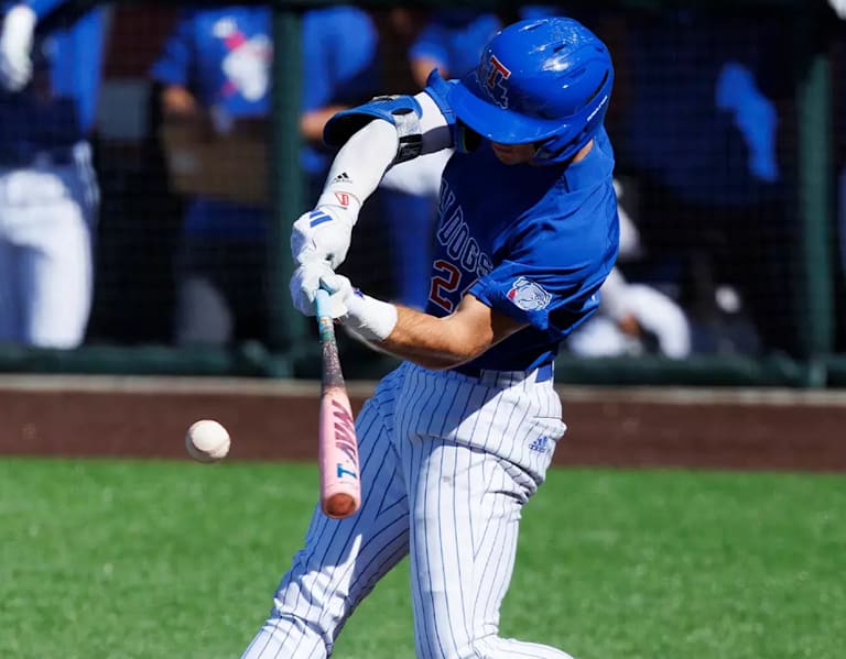 Dogs avoid elimination with win over Liberty