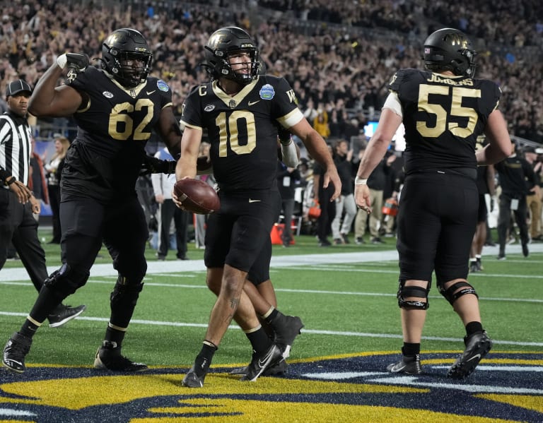 Hartman leads No. 20 Wake Forest to 38-10 romp in Gator Bowl