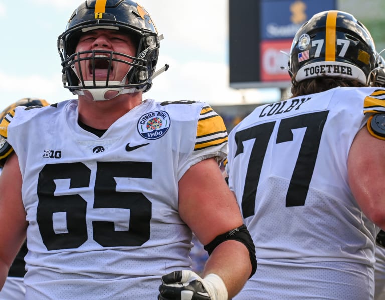 Iowa center Tyler Linderbaum says he'll remain in college football