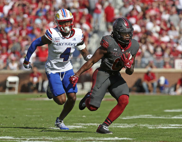 Oklahoma beats No. 19 Kansas 52-42 in Big 12 football game