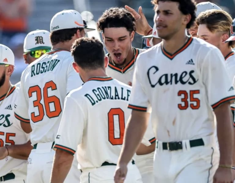 Miami Hurricanes head coach Gino DiMare gives instructions to his team  during the third inning of a NCAA baseball game against the Florida  Atlantic University Owls at Alex Rodriguez Park at Mark