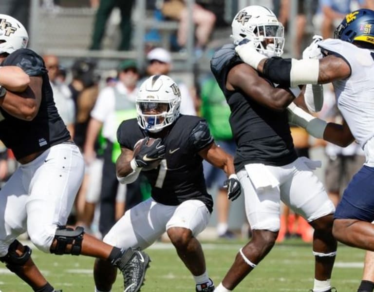 West Virginia facing challenge in UCF rushing attack led by Harvey