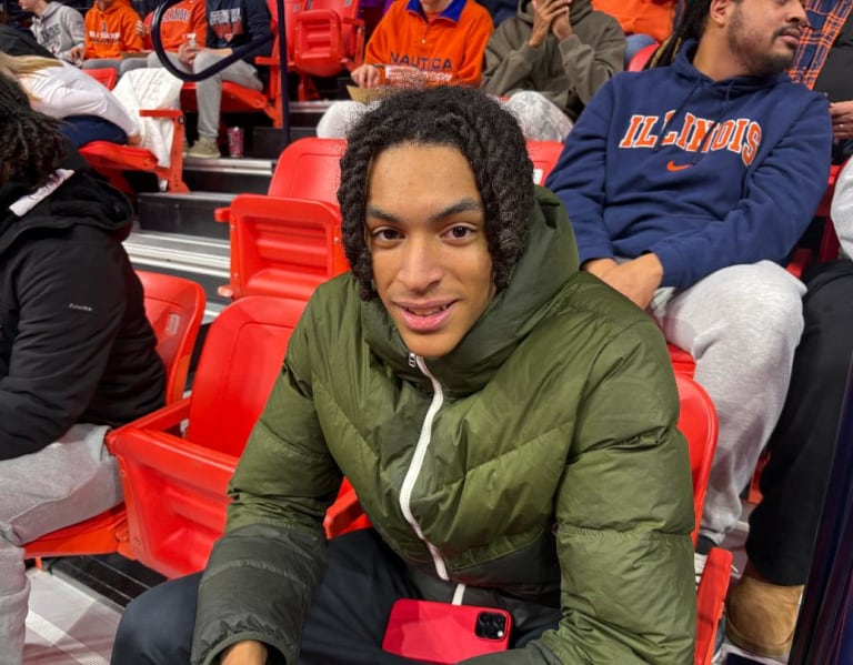 Junior wing Lincoln Williams checks out Illinois