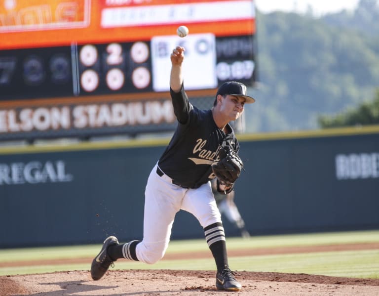 Rays pitcher warms up in full Vanderbilt football uniform