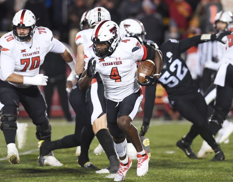 Texas Tech secures bowl eligibility in slugfest against Iowa State