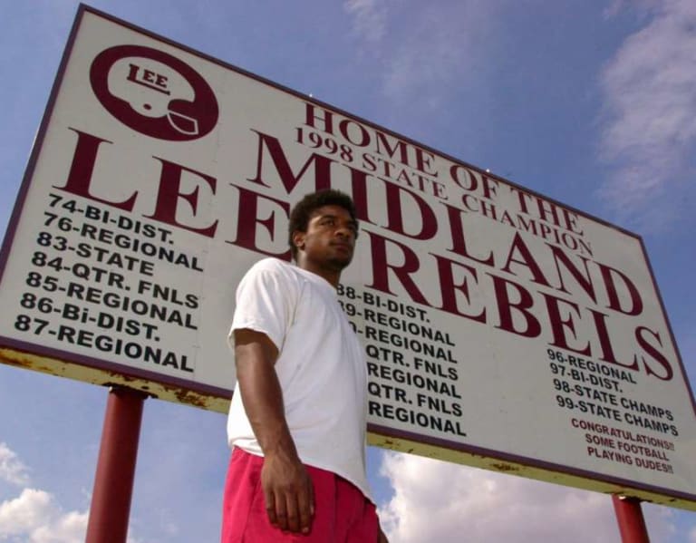 Texas honors late Cedric Benson with No. 32 sticker on football