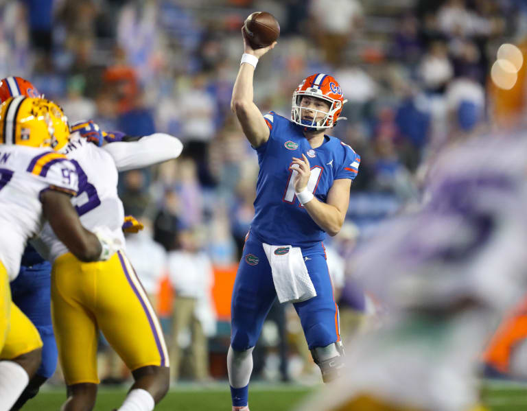 Danny Wuerffel congratulates Kyle Trask on TD record