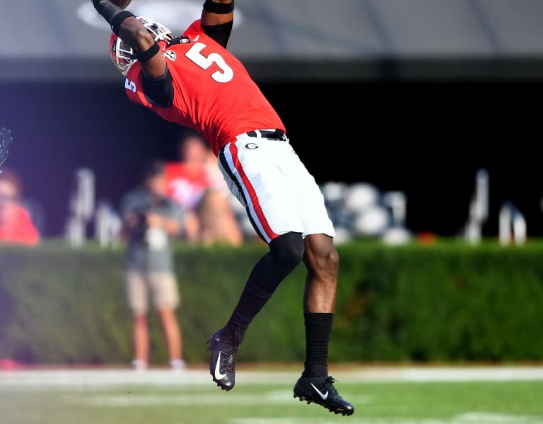 Indianapolis, United States. 10th Jan, 2022. Georgia Bulldogs defensive  back Kelee Ringo (5) breaks up an end zone pass intended for Alabama  Crimson Tide wide receiver Agiye Hall (84) during the second