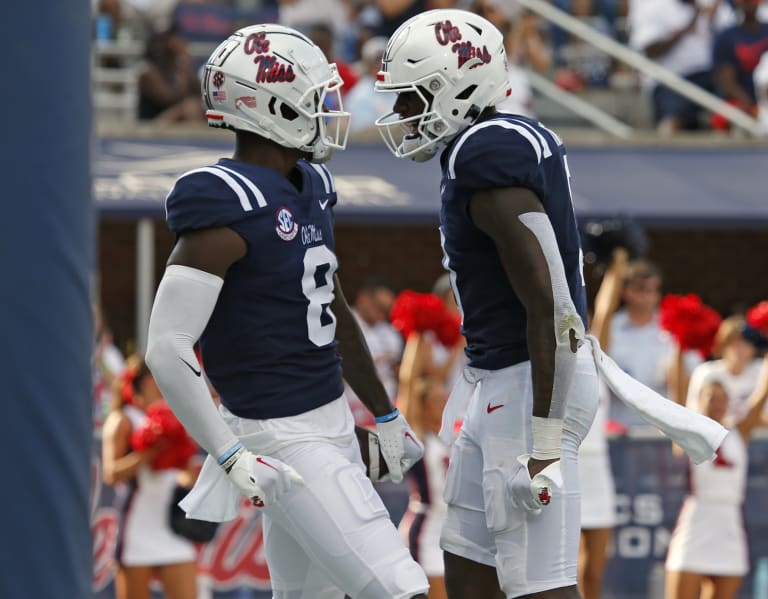 Miami DB celebrates interception by rocking football to sleep