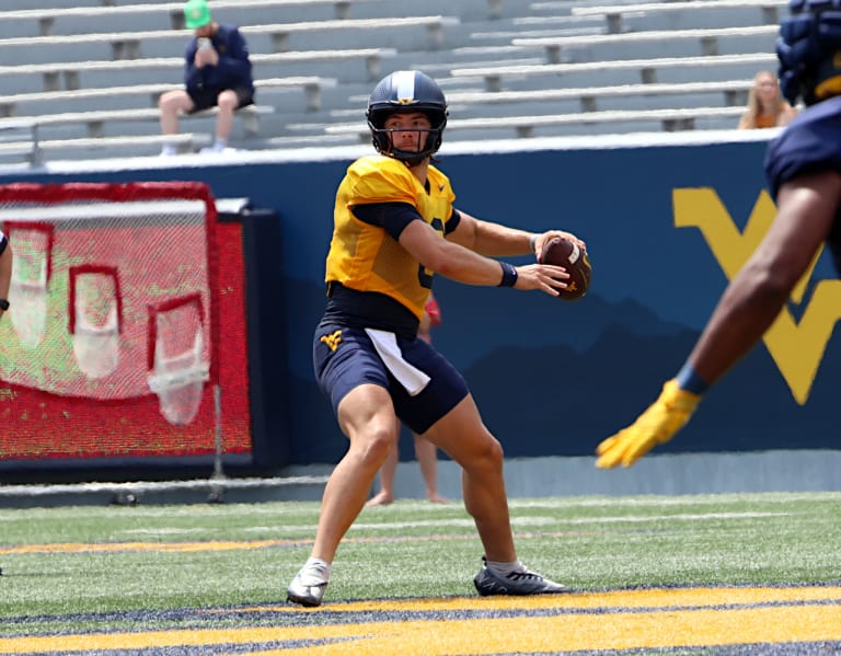 WVSports  –  Decision-making key factor in West Virginia quarterback battle