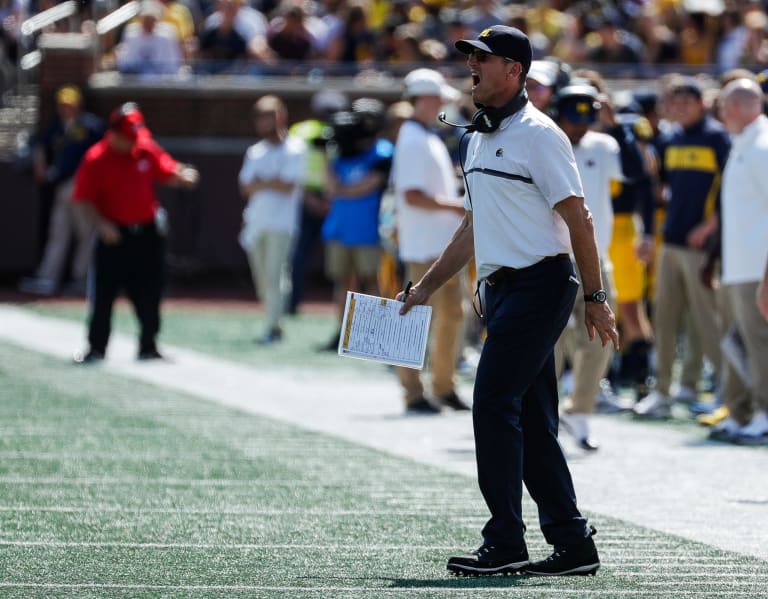 Jim Harbaugh speaks briefly on his future, mentions return to