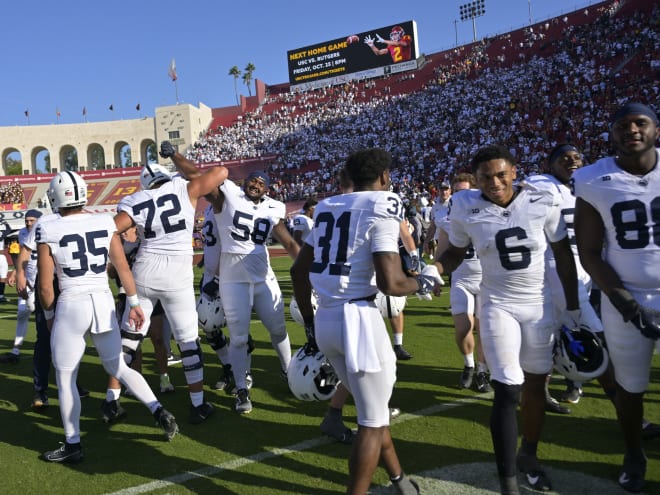 WATCH: Penn State player tries to plant team's flag on USC logo after game