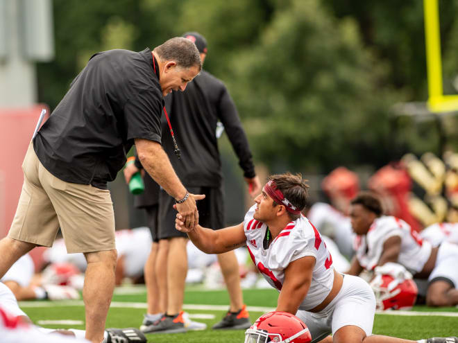 Greg Schiano talks to the press following Wednesday's practice