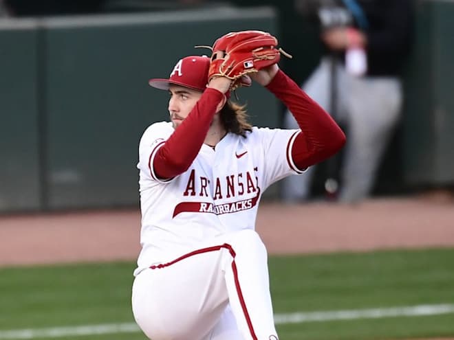 Root tosses complete game, Hogs run rule South Carolina