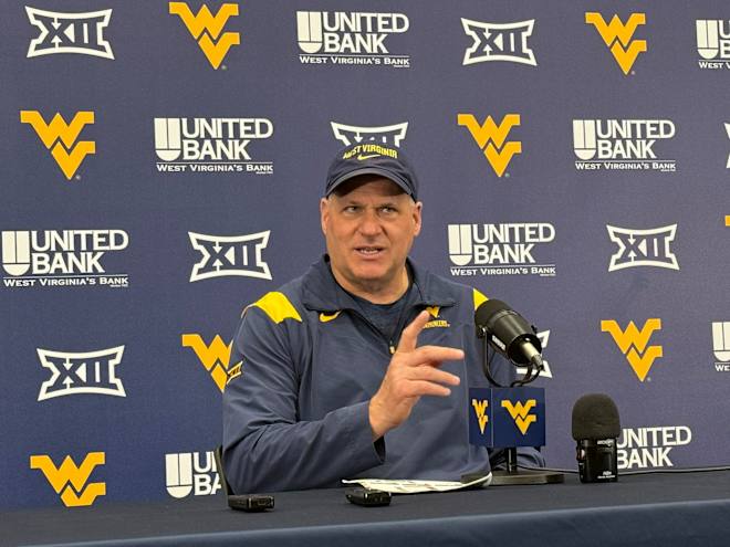 Rodriguez supports outside QB training, if it fits WVU system