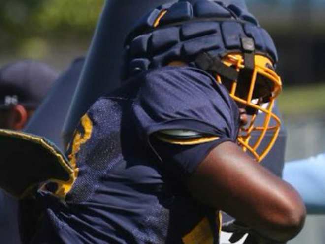 West Virginia adds JUCO DL Simmons to commitment list