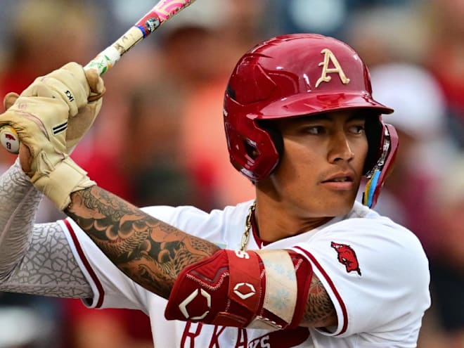 Clutch swings, dominant pitching push Hogs past UCLA, 7-3