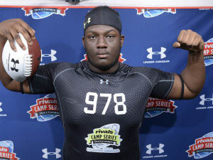 OL commit: `I'm trying to see how the coaching staff is'