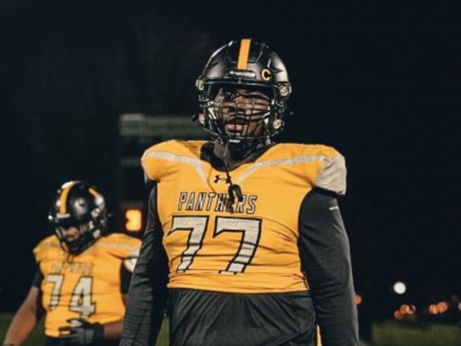 Edward Baker impressed with NC State, OL coach Garett Tujague