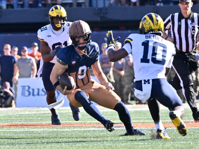 No. 22 Illinois tops Michigan 21-7