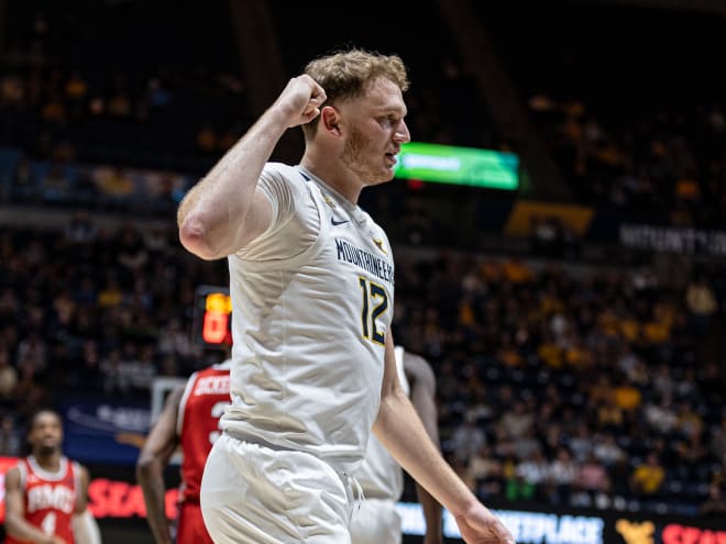 West Virginia steps up late to get gritty win over UMass