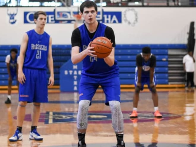 Hunter Dickinson near a college decision