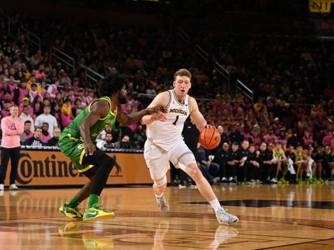 Danny Wolf recaps Michigan's 80-76 win over Oregon