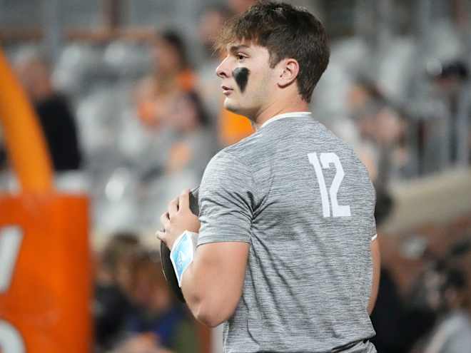 Tennessee quarterback Jake Merklinger getting work in with Vol receivers