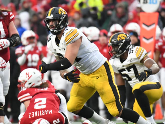 Three Hawkeyes earn AFCA All-American honors