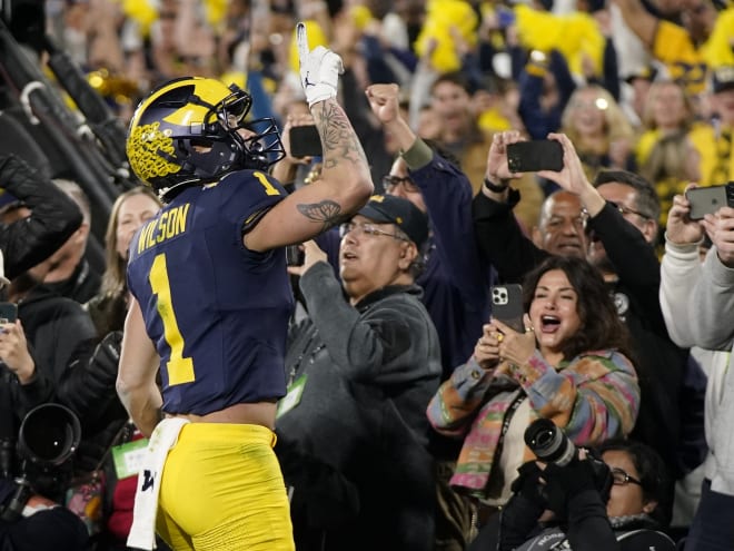 Michigan survives to beat Alabama in OT, advance to title game