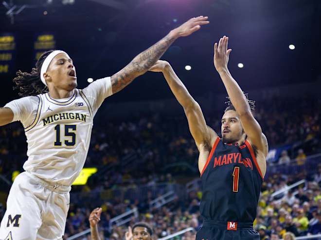 No. 13 Maryland tops No. 17 Michigan 71-65 for fifth road win of season