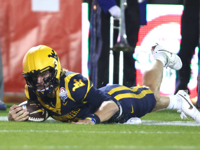 Scott says his early playcalling to blame in WVU's Frisco Bowl loss