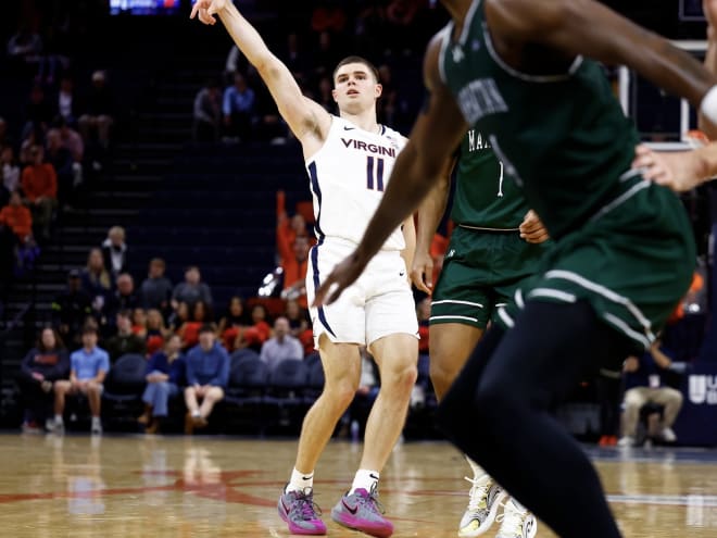 McKneely goes for 18 points to lead UVa past Manhattan 74-65