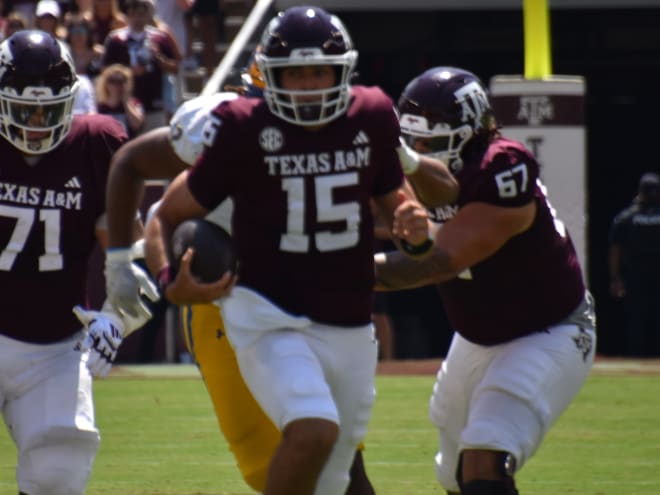 Aggies overwhelm Cowboys, 52-10