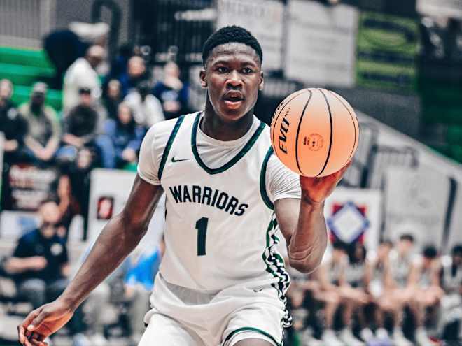 Four-star in-state guard commits to Arkansas