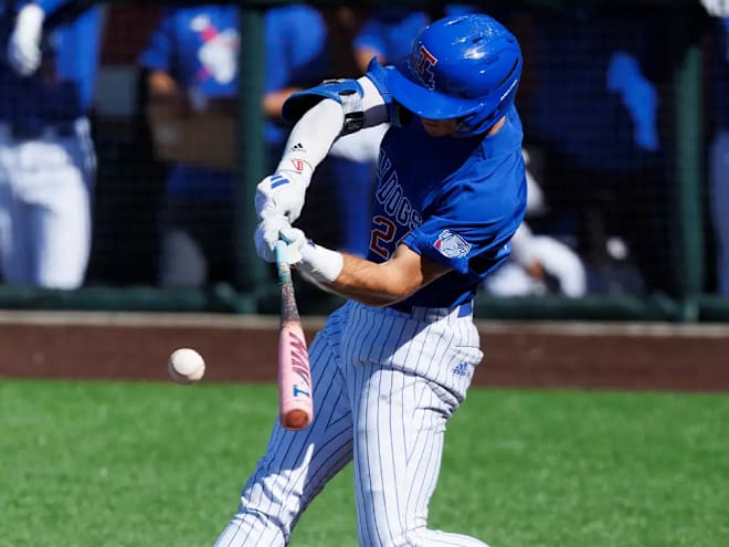 Dogs avoid elimination with win over Liberty
